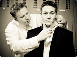 best man helping groom